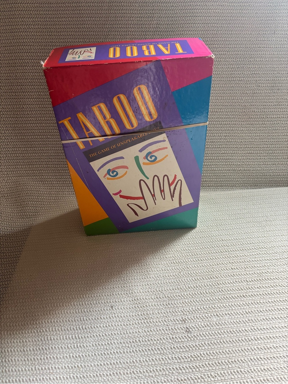 Taboo Board Game Box with Blue and Purple Artwork